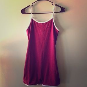 A maroon romper from fashion Nova.